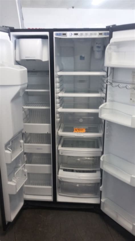 Stainless Side-By-Side Refrigerator. . Ge arctica refrigerator